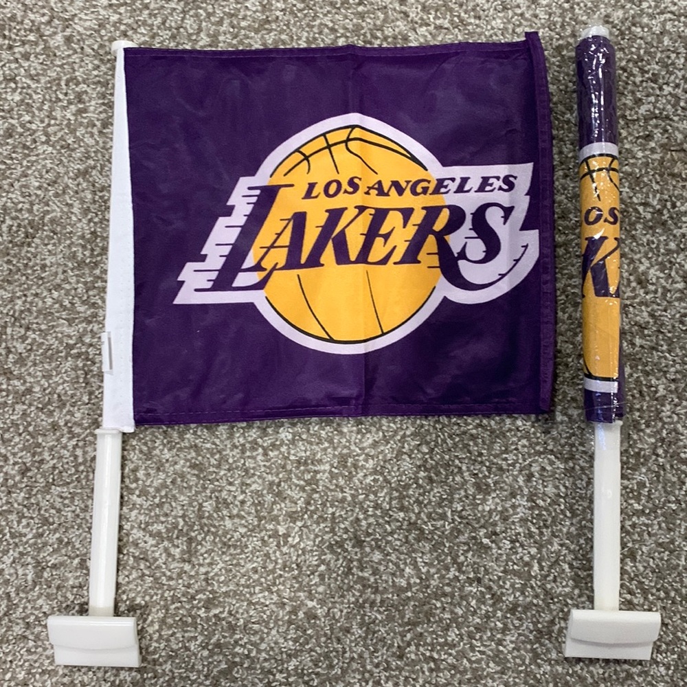 Los Angeles Lakers Car Flags. Set contains 2 flags. Flag is 12” x 14”.